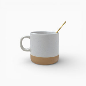White Ceramic Mug with Gold Spoon