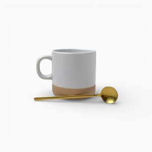 White Ceramic Mug with Gold Spoon